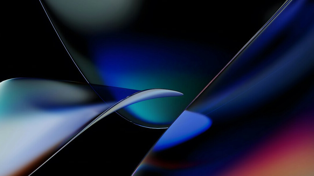 Reflections of screens on a dark glass surface with soft colors
